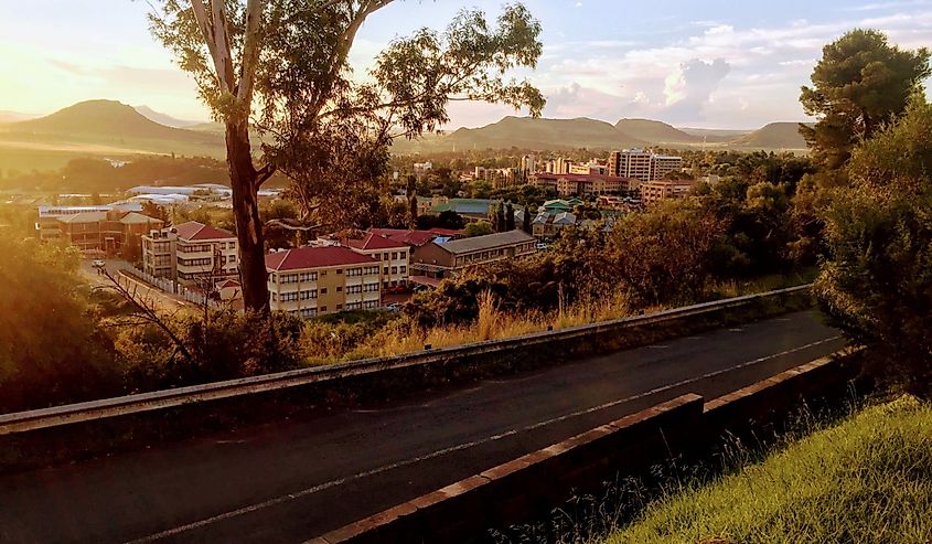 The city of Maseru, Lesotho at sunset, surrounded by hills