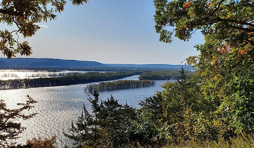 View of the Mississippi River through the trees in Mcgregor, Iowa