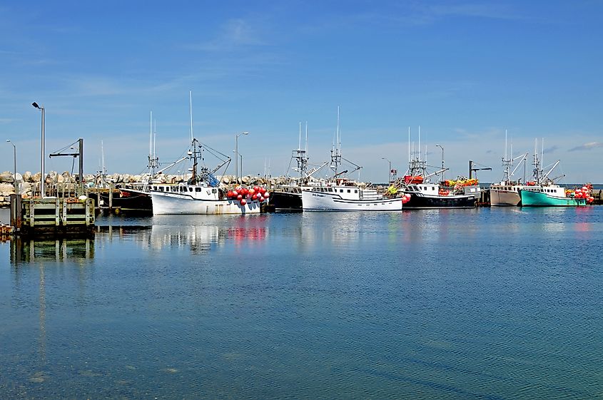Boats docked along the harbor in Clark's Harbour, Nova Scotia