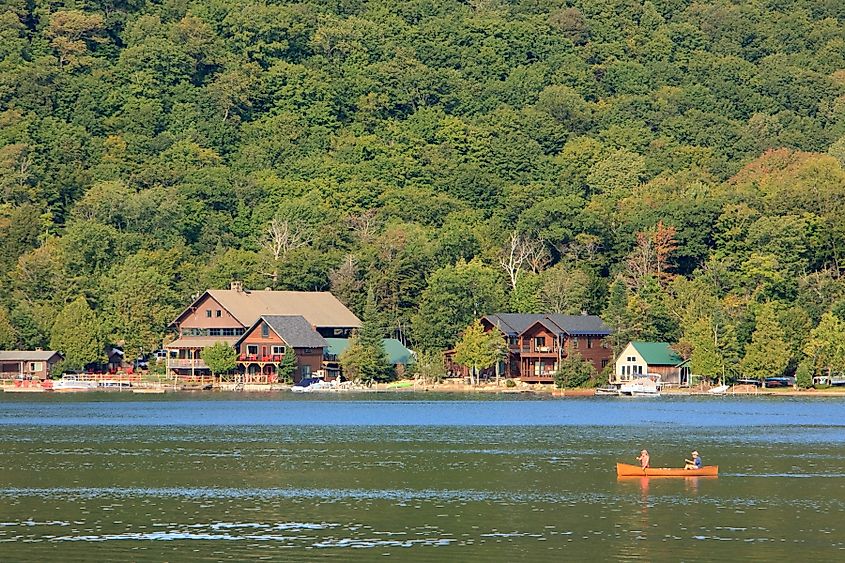 Scenic view of homes along the waterfront in Blue Mountain Lake, New York