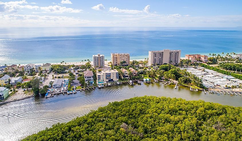 Aerial Drone View of Bonita Springs Beach, Florida with the Bay and Mangroves in the Foreground and the Gulf of Mexico in the Background