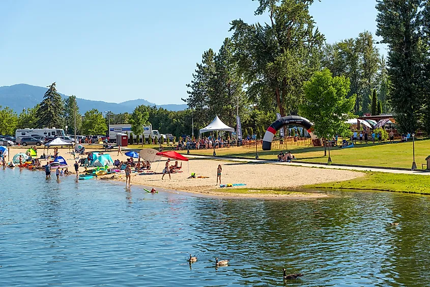 Idahoans enjoying a sunny summer day at City Beach along Lake Pend Oreille in Sandpoint, Idaho. Editorial credit: Kirk Fisher / Shutterstock.com