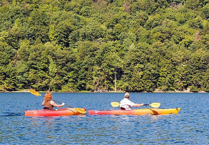 Kayakers enjoying a bright, sunny day at the Canadice Lake.