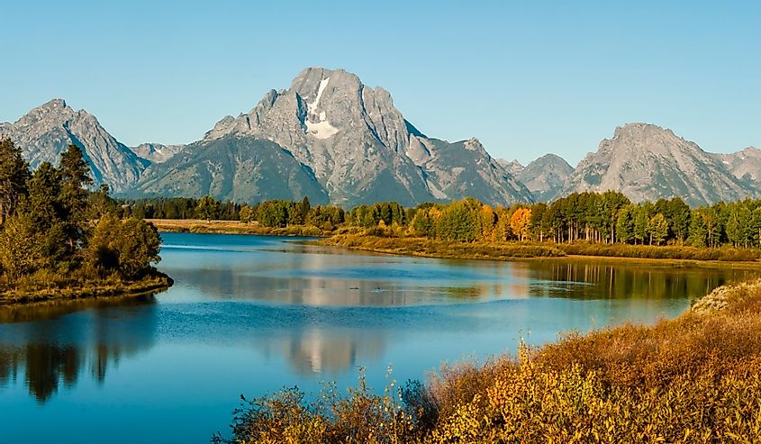 Colorful Autumn foliage and Snake river Grand Teton National Park, Wyoming.