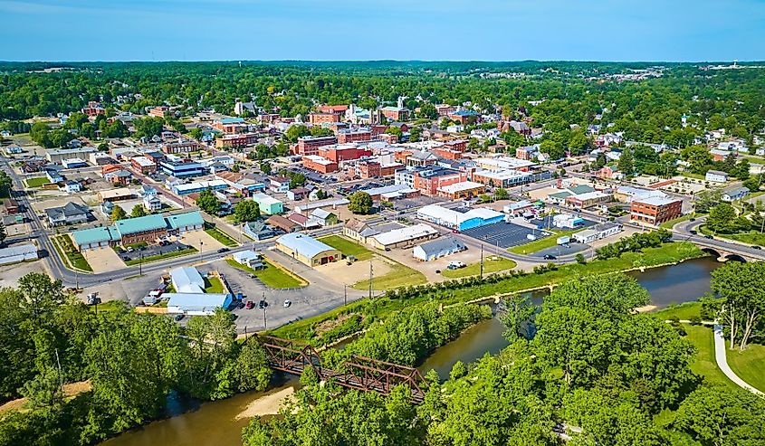 Aerial view of park area leading to wide view of Mount Vernon city in Ohio