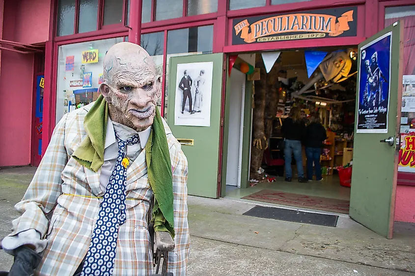 A man in a spooky costume outside the Peculiarium in Portland, Oregon.