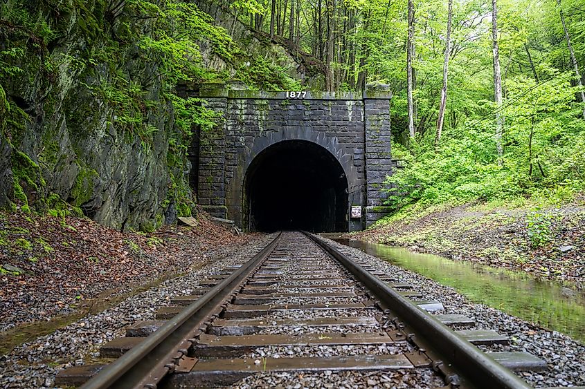 East Portal of the historic Hoosac Tunnel near North Adams, MA—an iconic 19th-century railroad tunnel framed by rugged stone and forested Berkshire scenery.