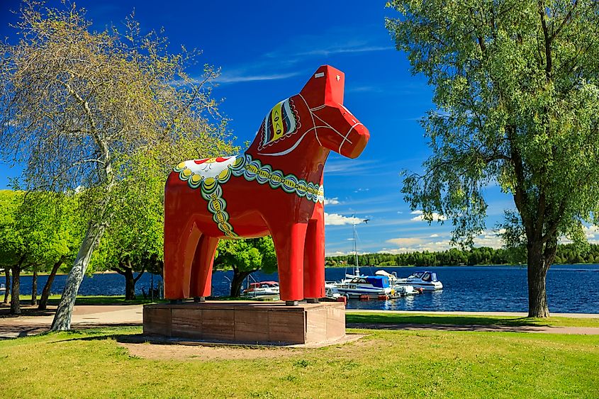 A red Dala horse in Mora, Sweden. Editorial credit: AndreiZu / Shutterstock.com