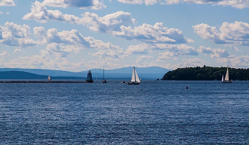 Sailboats on Lake Champlain, Vermont with Adirondack Mountains in the background