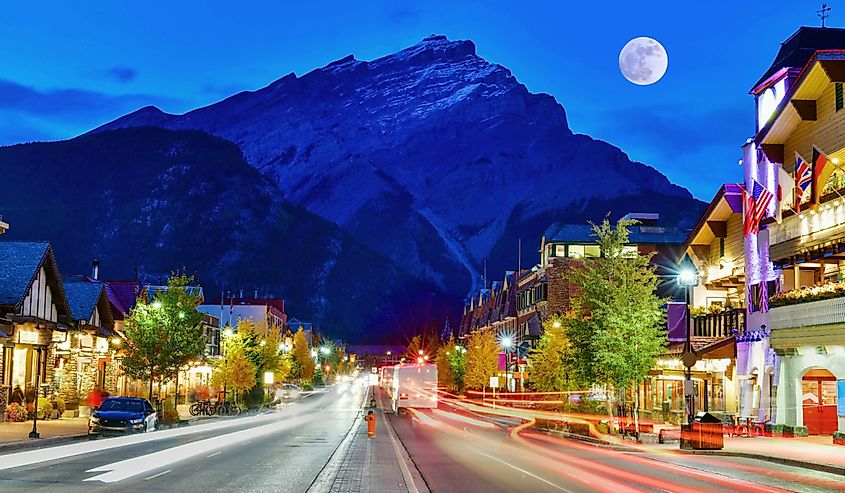 Street view of famous Banff Avenue at twilight time. 