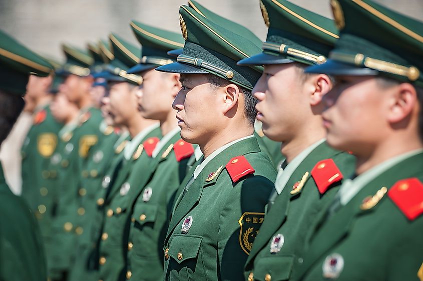 Chinese soldiers attend a parade at Tiananmen square on November 8, 2012 in Beijing, China. Credit: Hung Chung Chih / Shutterstock.com