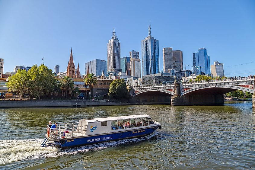 Tourists cruising the Yarra River in the tourist board