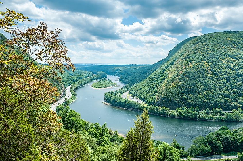 The Delaware River flowing through the mountains in the Delaware Water Gap area.