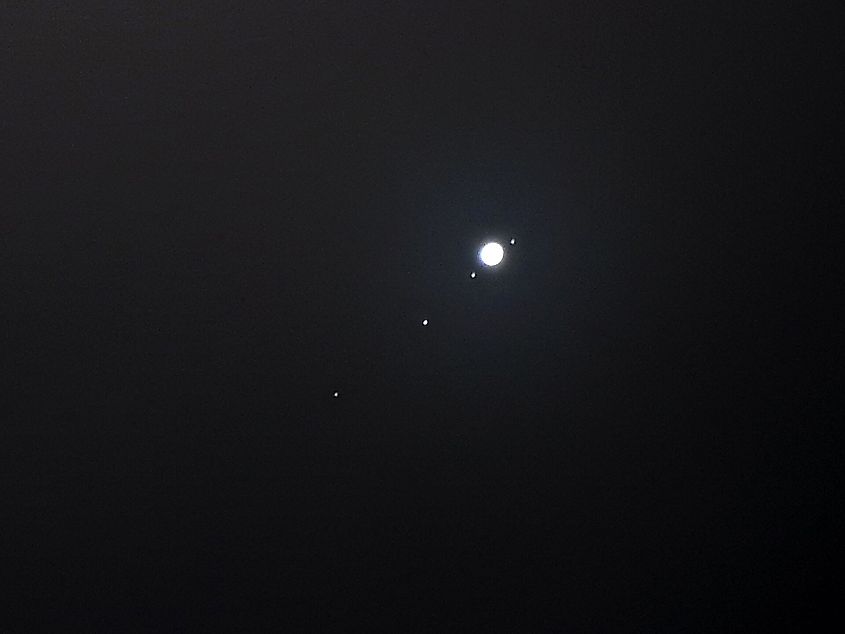 Jupiter and moons, taken with Nikon. Europa on right. Rehman Abubakr, CC BY-SA 4.0, via Wikimedia Commons