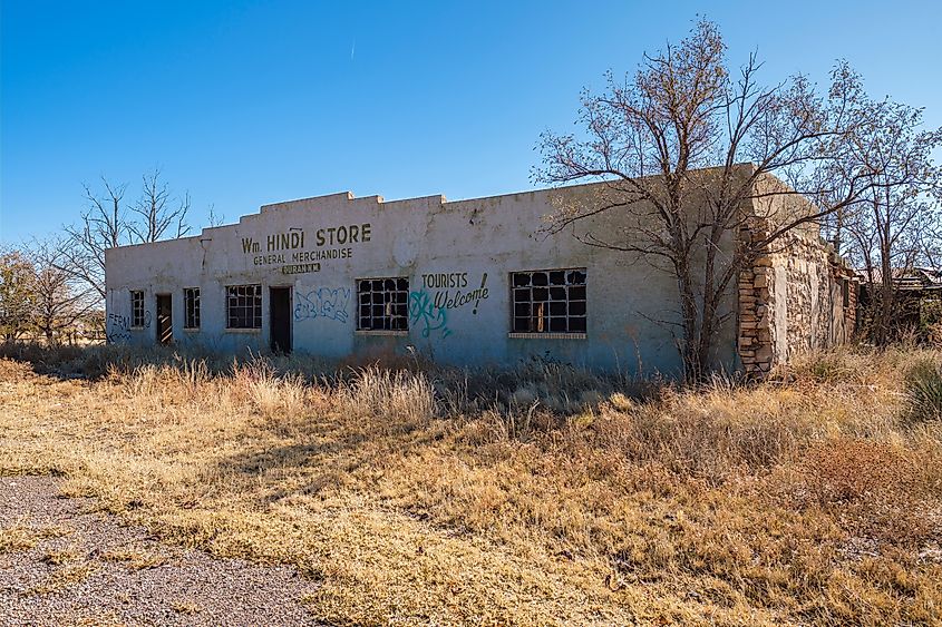 ChatGPT said: An abandoned merchandise store in the rural desert town of Duran, New Mexico