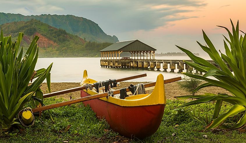 Hawaiian canoe sits on the shores of the Hanalei Pier