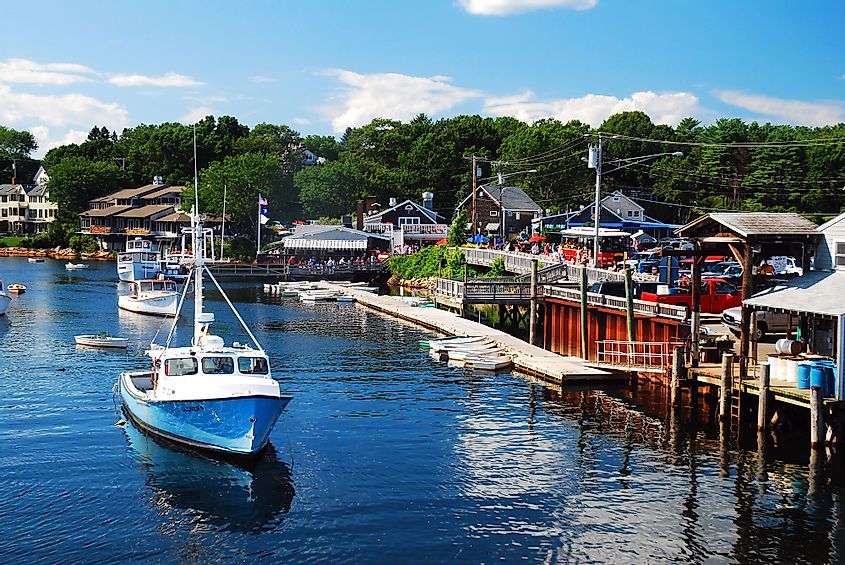 Boats are moored in the waters of Perkins Cove, Ogunquit, Maine