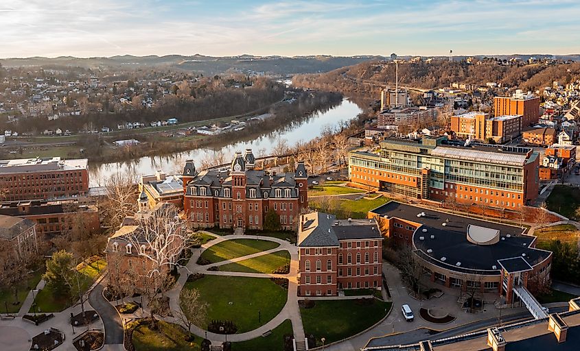 Aerial drone panoramic shot of the downtown campus of WVU in Morgantown West Virginia showing the river in the distance, via Steve Heap / Shutterstock.com