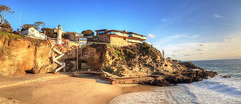 Blue sky over the coastline of One Thousand Steps Beach with tidal pools and cliffs in Laguna Beach, California
