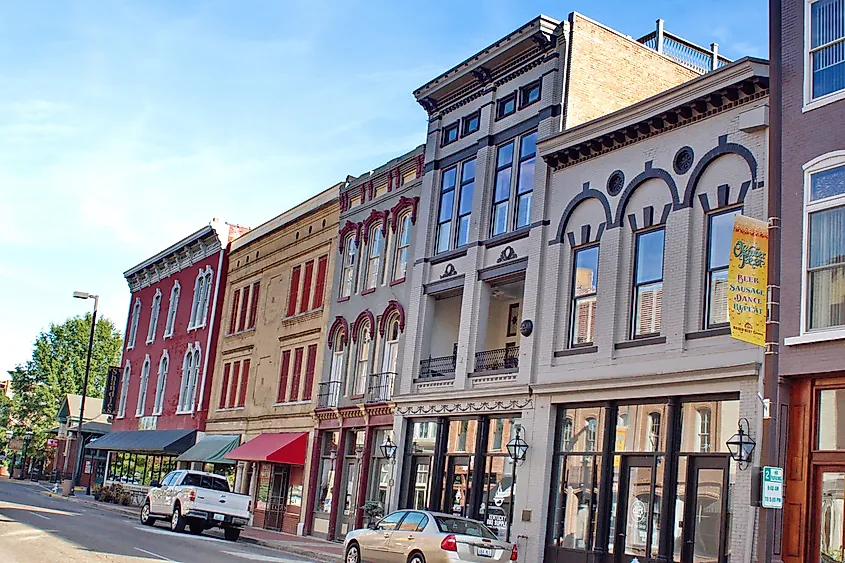 Colorful row of historic buildings lining the main street in downtown Paducah, Kentucky, USA.