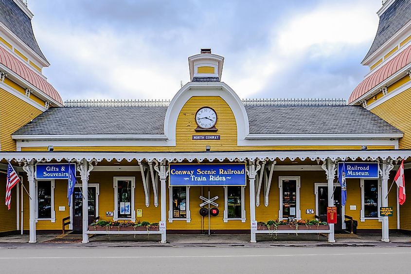 Exterior view of a historic, timber-built railroad station 