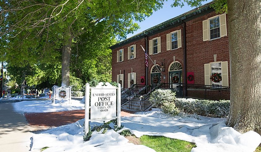 Snow on the lawn of the Post Office was installed as part of a winter scene being filmed in Essex, Connecticut.