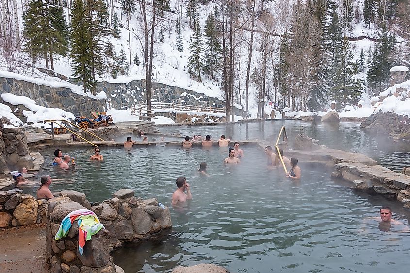 People enjoy the outdoor Stawberry Park Natural Hot Springs in Steamboat Springs, Colorado
