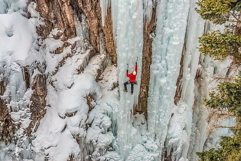 Ice climber ascending at Ouray Ice Park, Colorado