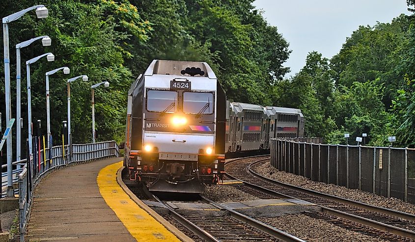 New Jersey Transit Transit departing from Hohokus station on a summer day