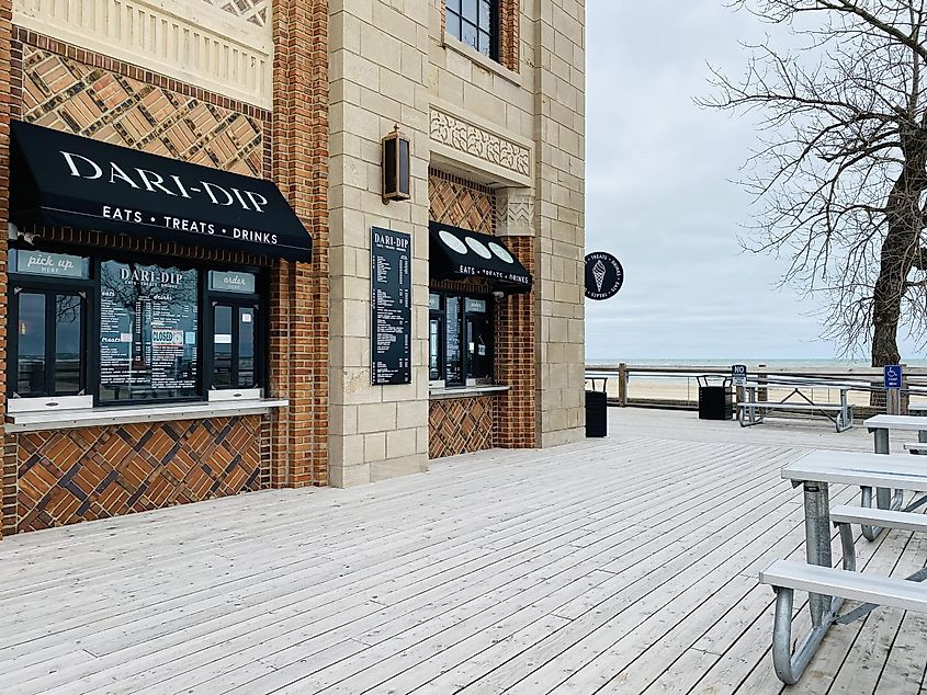 A beachside concession stand and picnic area next to the sands of Lake Michigan