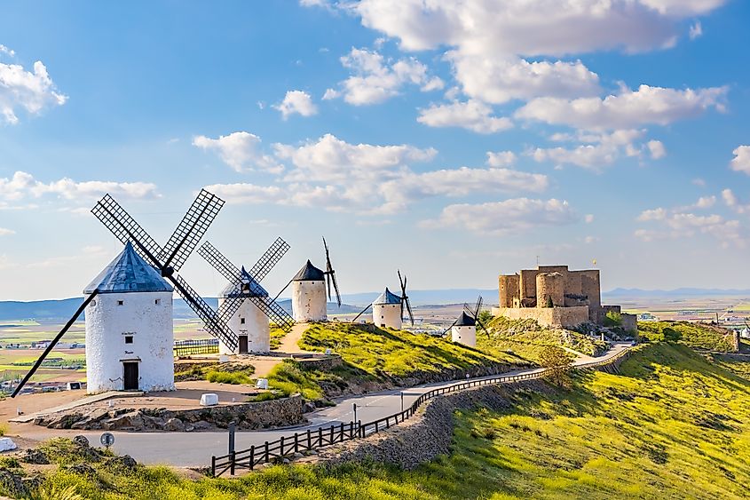 Historic windmills and castle in Consuegra, Spain.