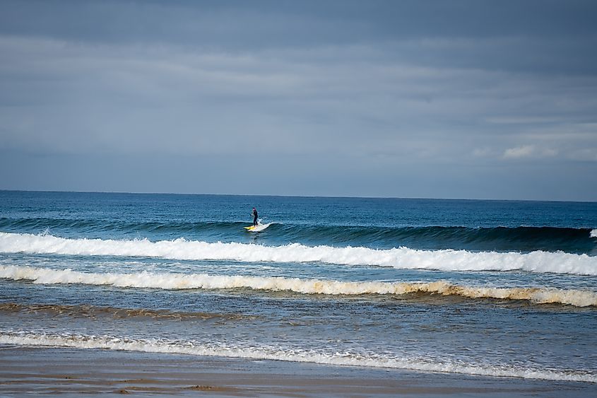 Waves on a beach at Sandy Point, Victoria, Australia. jacksonhu2207 via Shutterstock