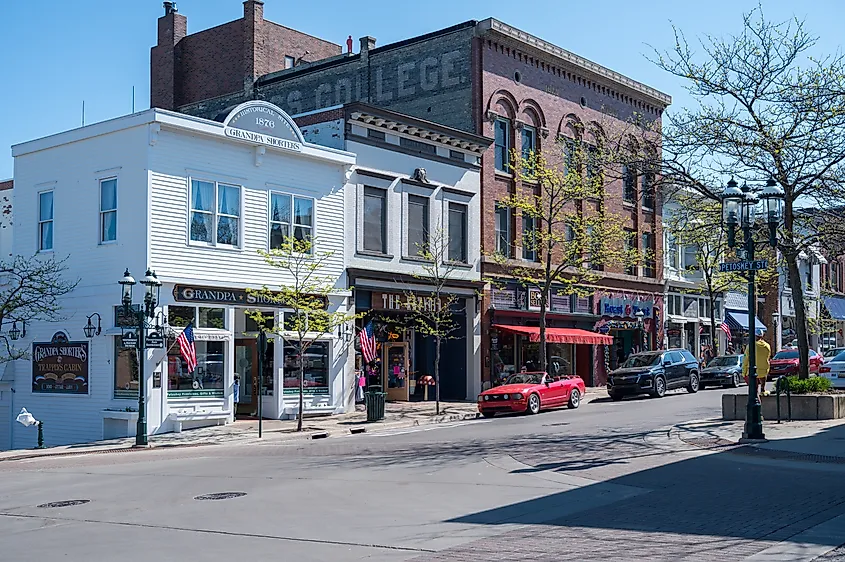 A street view with shops and pedestrians in Petoskey, Michigan.