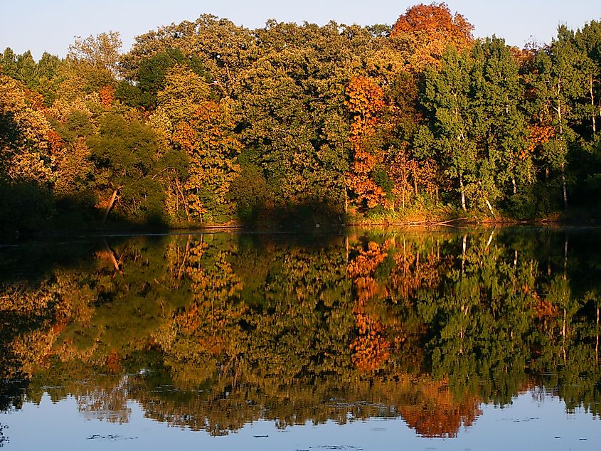 Beautiful fall colors reflect off a pond at Kettle Moraine State Forest in Wisconsin.