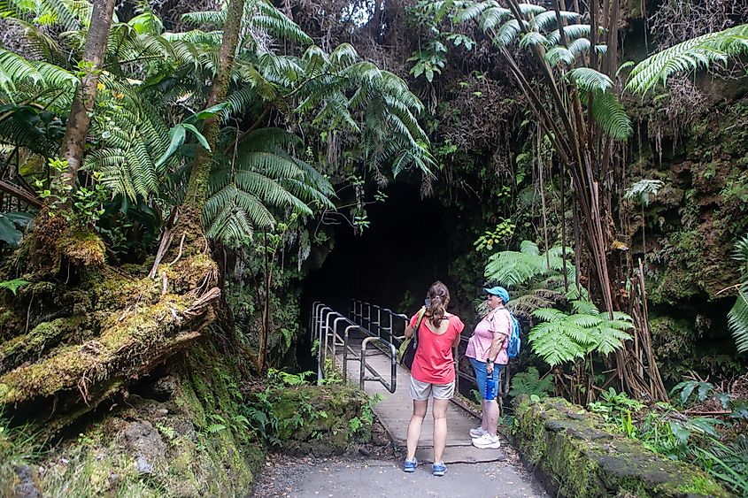  Visitors at the entrance of the Nahuku lava tube at the Hawai‘i Volcanoes National Park on the Big Island of Hawaii.