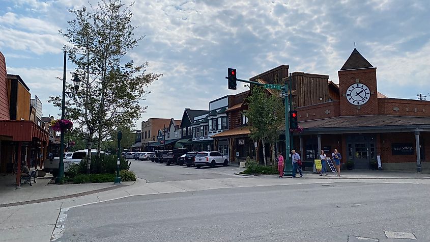A red-brick clocktower stands at the intersection of Whitefish, Montana's Old West downtown