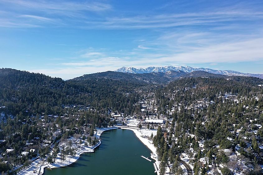 An aerial view over Lake Gregory in Crestline, California after a winter spell.