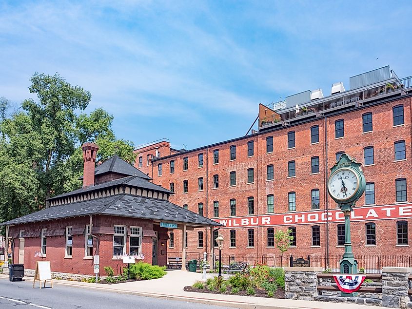 Lititz, PA, USA July 4, 2024: The The Wilbur Chocolate Company, and Lititz Welcome Center at Lititz Spring Park, downtown