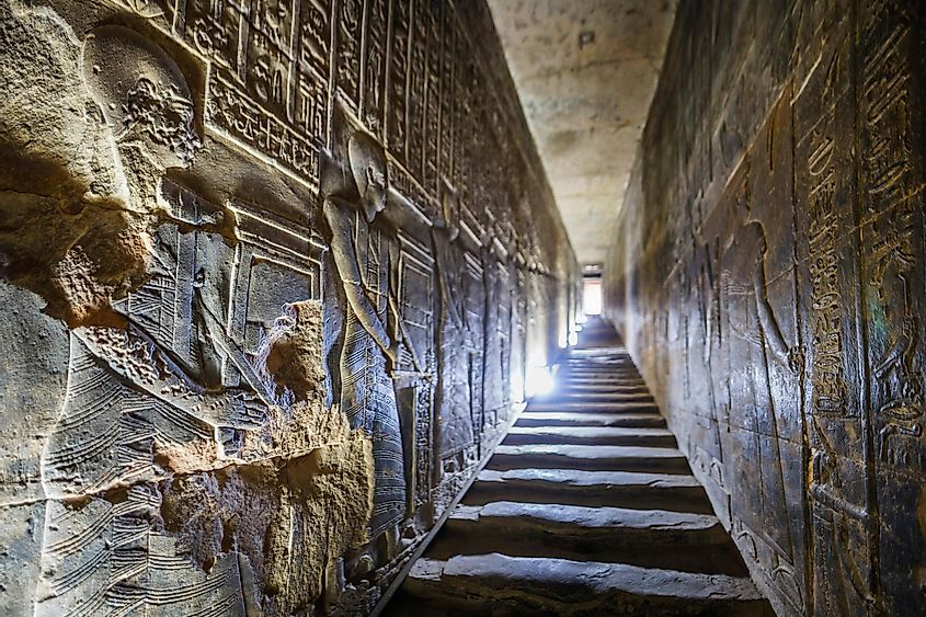 Corridors with ancient hieroglyphs and reliefs in the temple of the goddess Hathor in Dendera