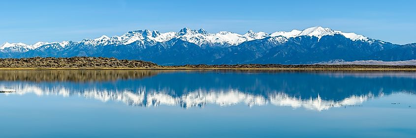 The twin summits of the Spanish Peaks rising above southern Colorado. Credit: Sean Xu/ Shutterstock.com