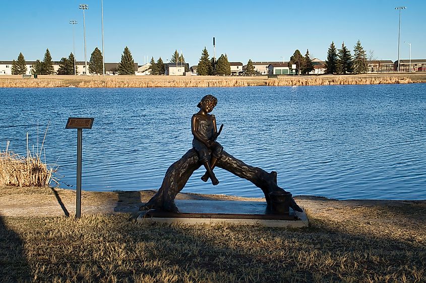 Statue next to the water at Dalbey Memorial Park in Gillette, Wyoming