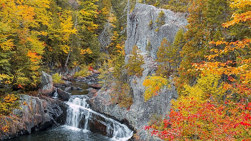 Fall foliage overlooking Buttermilk Falls in Gulf Hagas