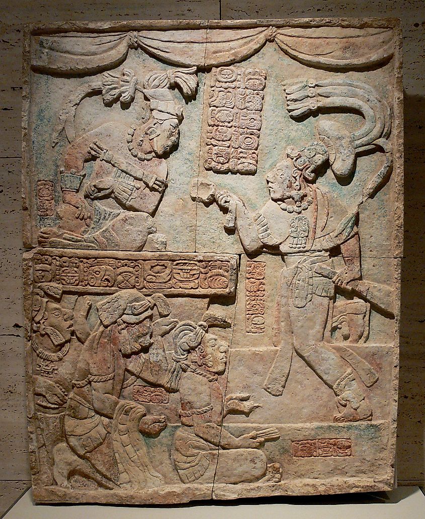 Mayan bas relief carving showing captives of war being presented before the Mayan king. 