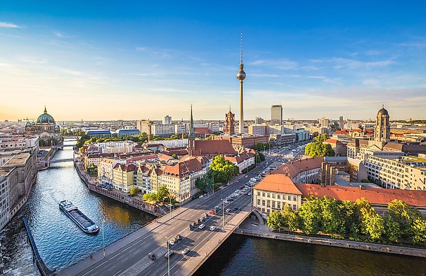 Aerial view of Berlin skyline and Spree river in beautiful evening light at sunset in summer, Germany