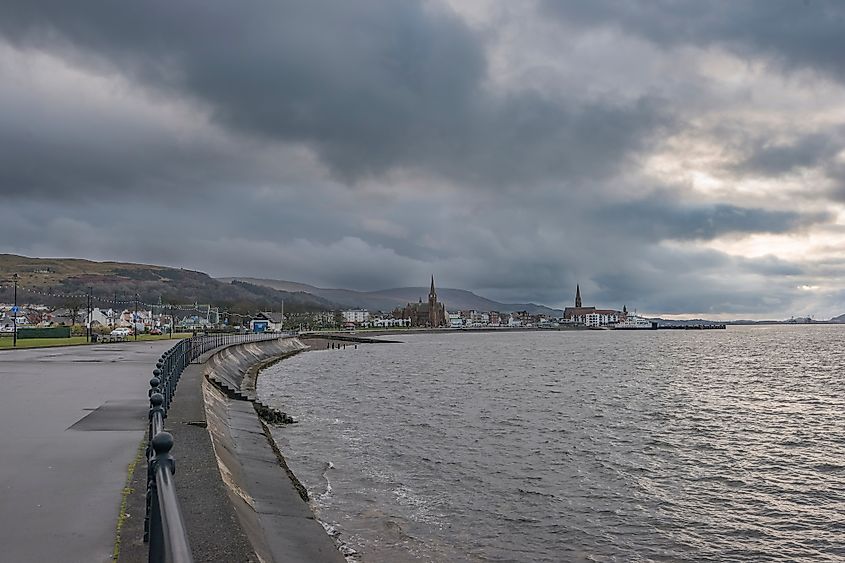 The town of Largs set on the Firth of Clyde on the West Coast of Scotland and looking along the North Promenade to the town centre in dull cold winter.