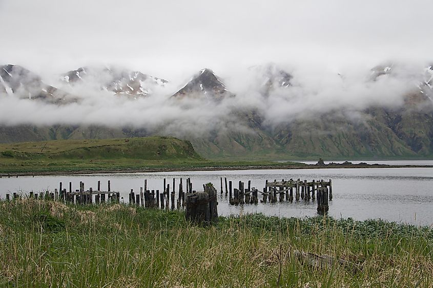 View of massacre bay, island of Attu, Aleutians with mountains and low clouds.