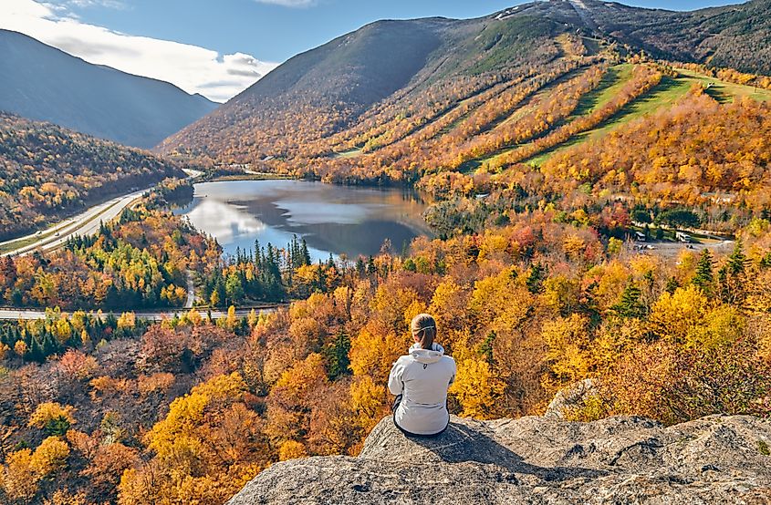 Fall foliage enhances the beauty of the Franconia Notch State Park, New Hampshire.