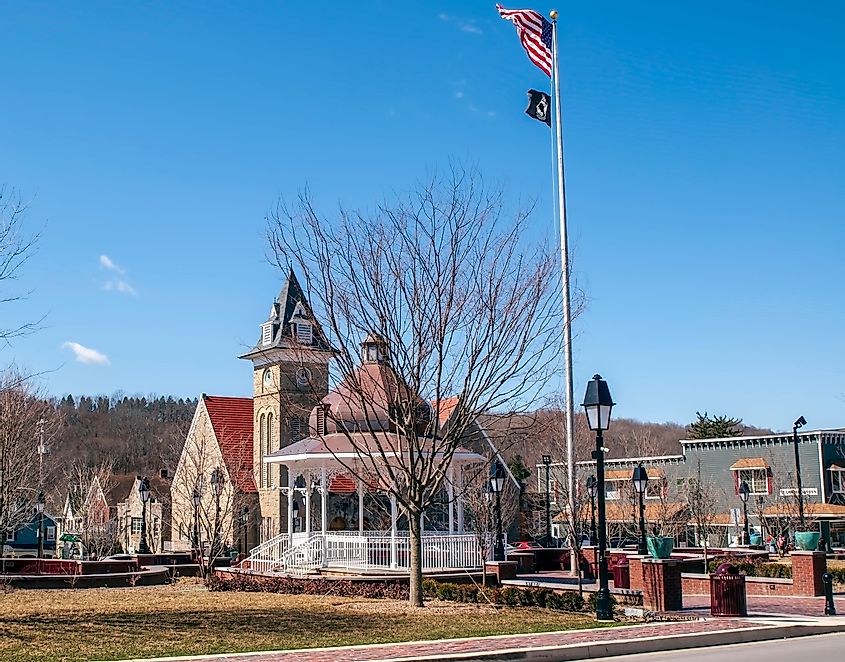 The gazebo in the town diamond with the Heritage United Methodist church behind it on a bright spring day, via woodsnorthphoto / Shutterstock.com