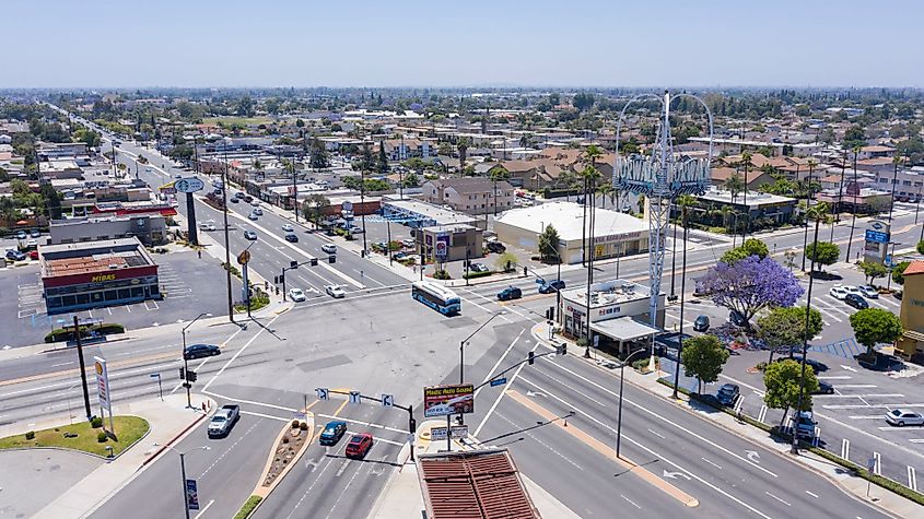 Sun shines on the historic Norwalk Town Square sign in Norwalk, California