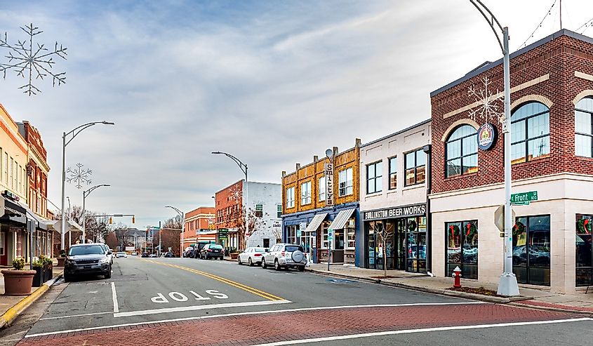 Wide angle view of Front Street from Main Street toward Spring Street, showing Burlington Beer Works, Smitty's and other businesses.